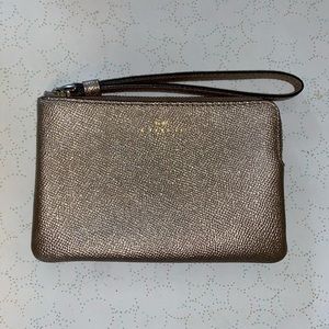 NWOT sparkling gold Coach corner zip wristlet